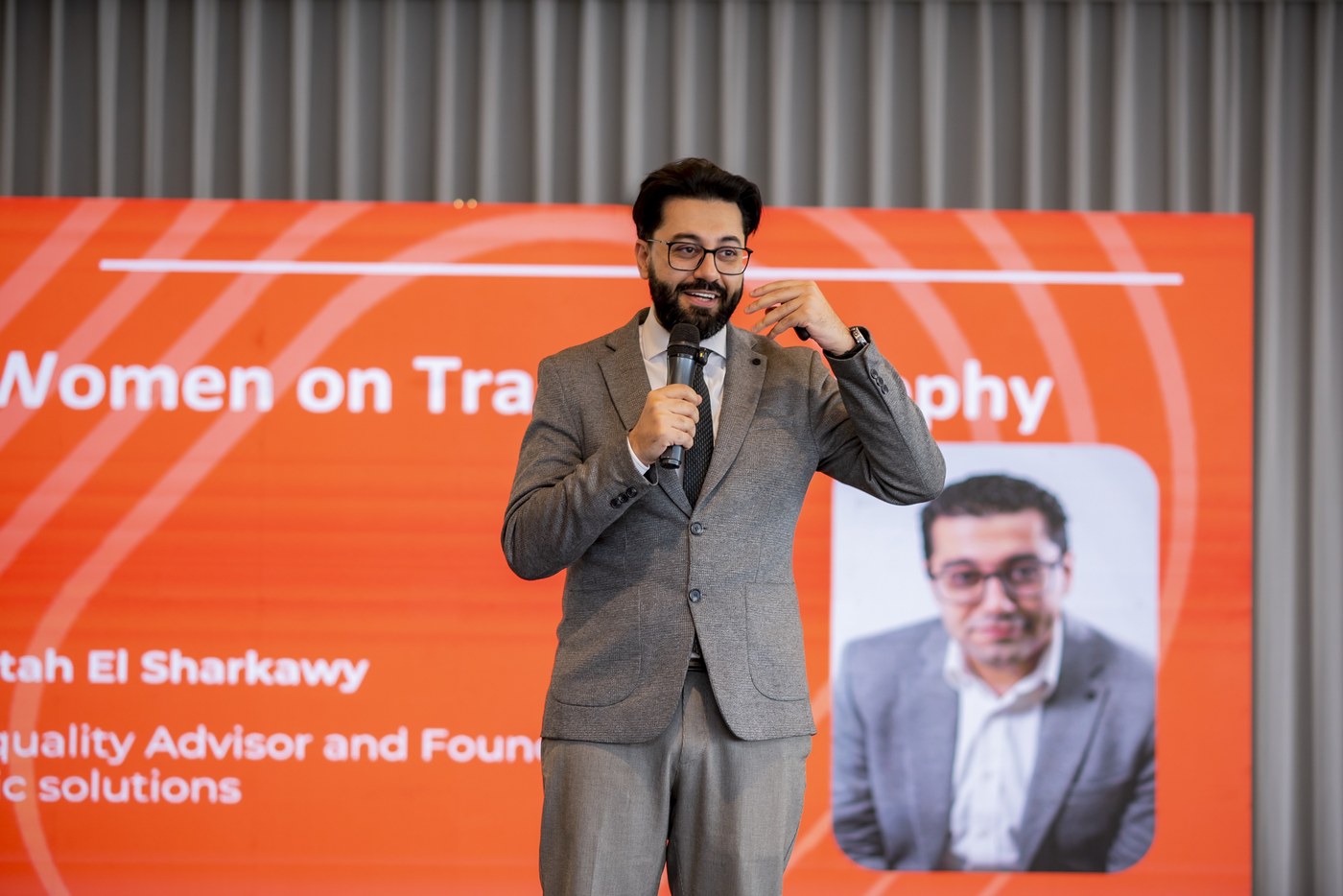 Abdelfattah Elsharkawy on stage making the business case for equality